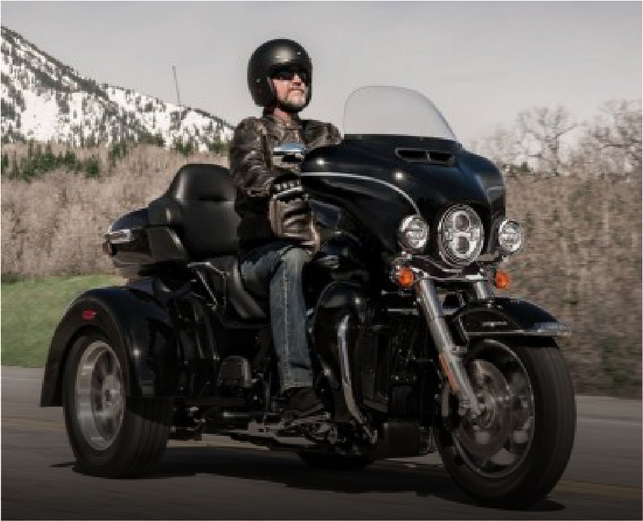 Three Wheel Course Man on a three wheel motorcycle